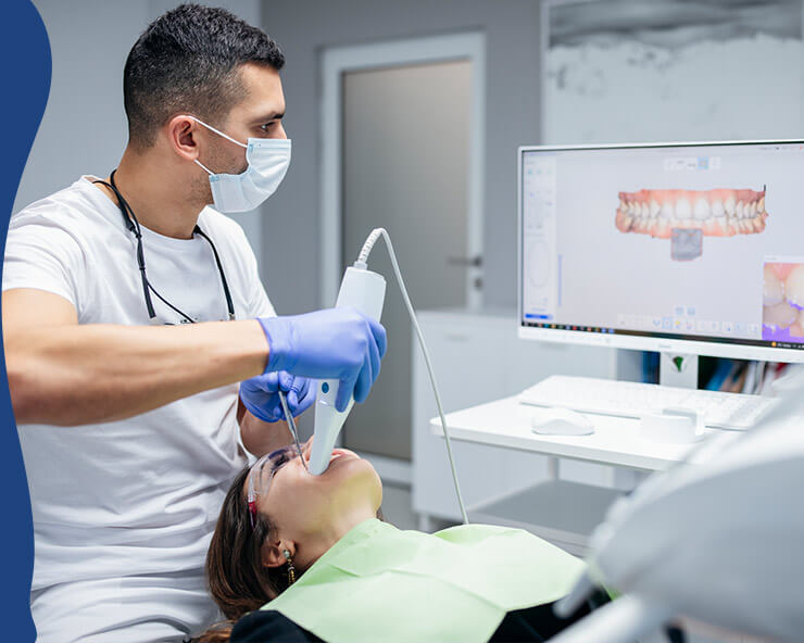 A dentist in a mask and gloves performing a digital scan of a patient's teeth during an orthodontic check-up.